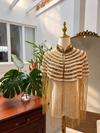 An elegant handmade Pearl beaded cape with delicate detailing and flowing fringe, perfect for bridal looks, weddings, dinner outfits and sophisticated evenings.